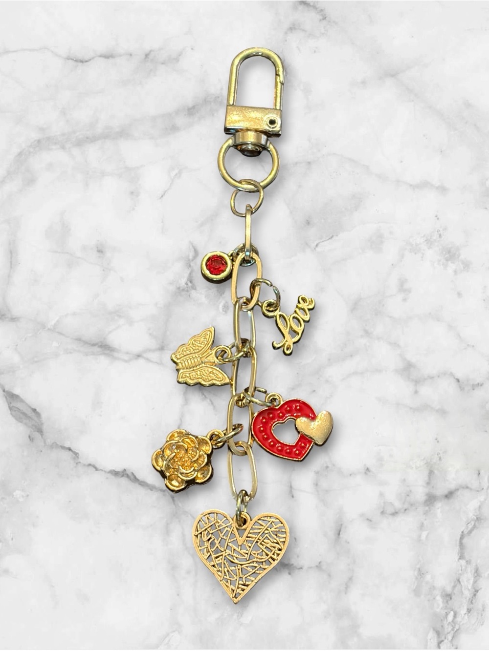 Gold Tone Heart & Charm Keychain with Red Accent